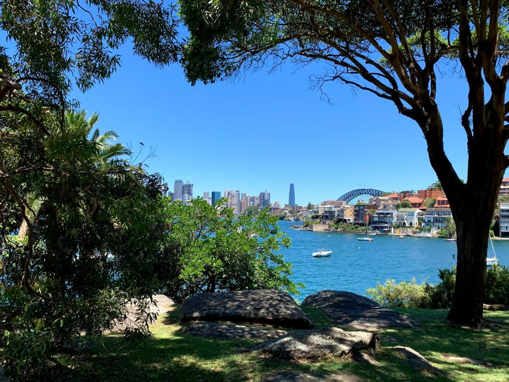 View of Sydney Harbour Bridge with Barangaroo in the background, as seen from Cremorne point.